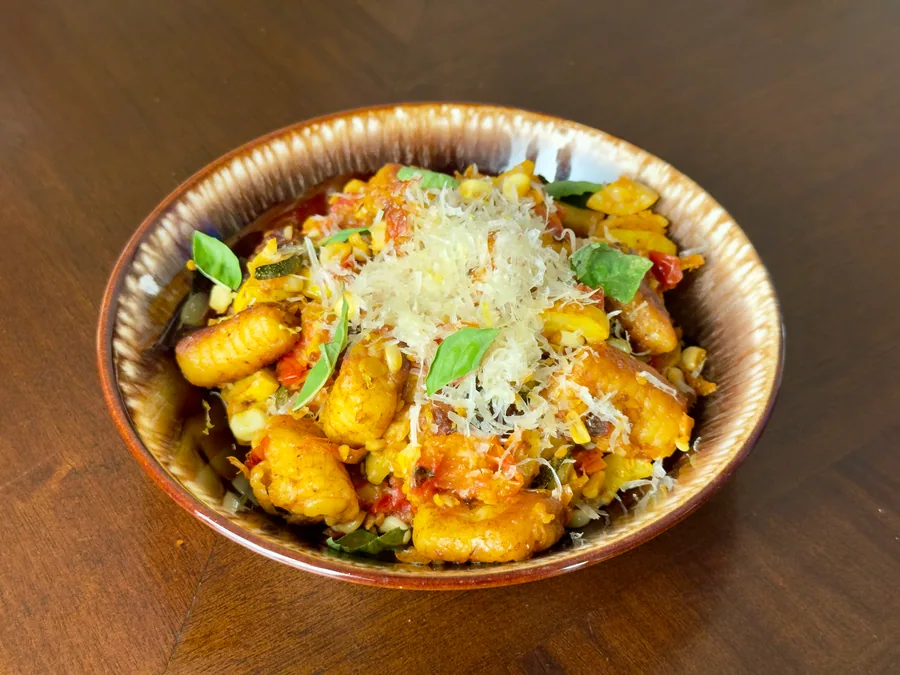 Ricotta gnocchi with sweet corn, summer squash, crisp sage, and Parmesan