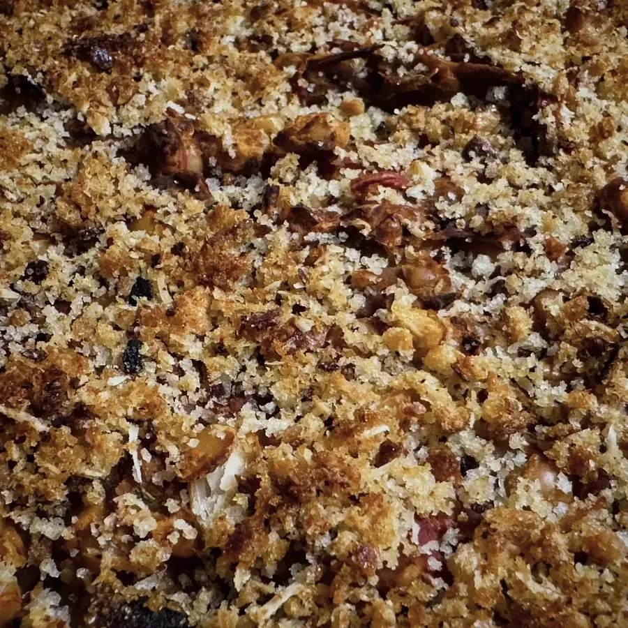 White bean, roasted tomato, and rosemary gratin with a crisp Parmesan and panko topping